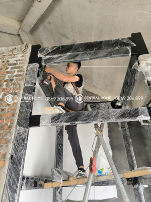 lắp đặt khung kính thang máy